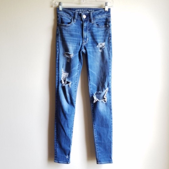 American Eagle Mid Wash Blue Distressed Ripped Mid Rise Skinny Jeans Size 00 - Picture 1 of 8